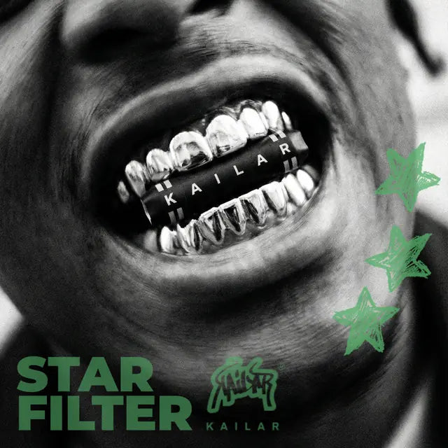 Bouche rieuse avec des grills argentés où est écrit Kailar, avec le texte « Star Filter »